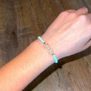 Infinity sign bracelet with turquoise beads